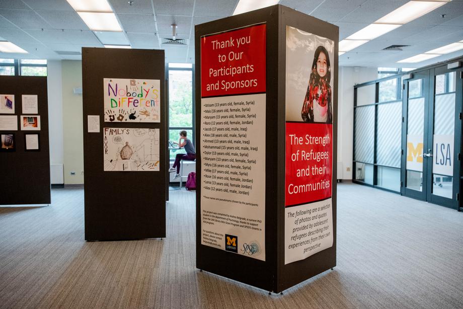 Hatcher Gallery Exhibit Space with photos and art on movable walls. 