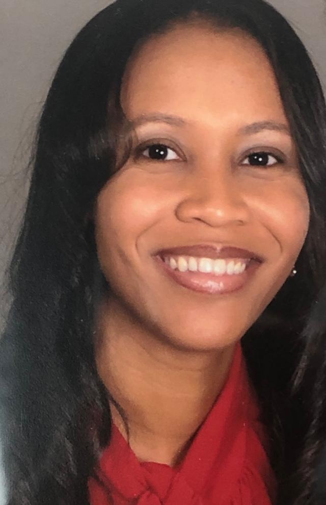 Black woman in a red shirt