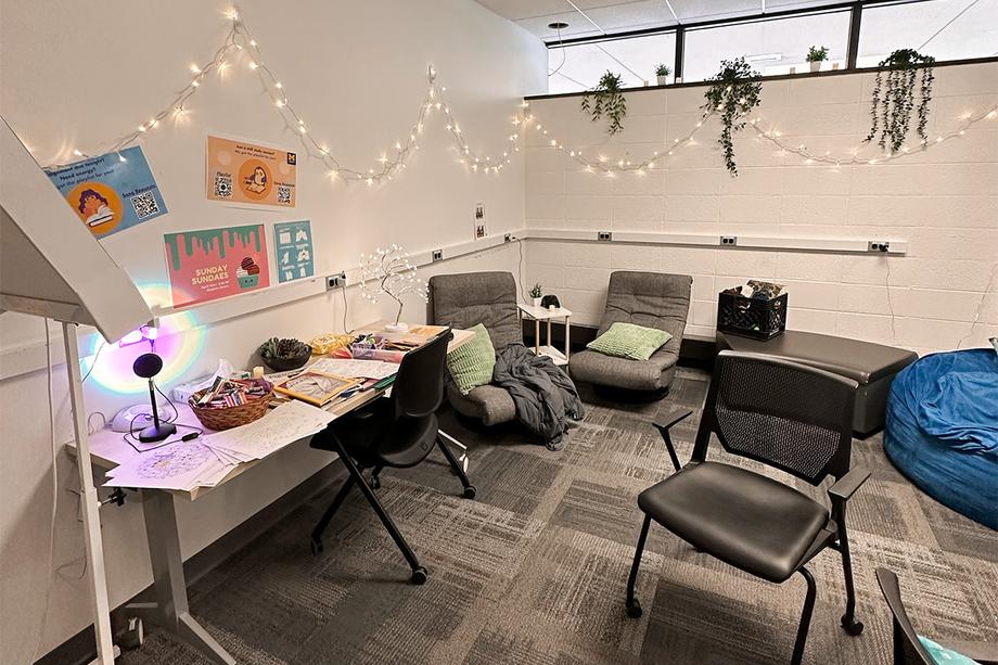 Twinkle lights, plants, bean bag on other comfy seating, and coloring supplies